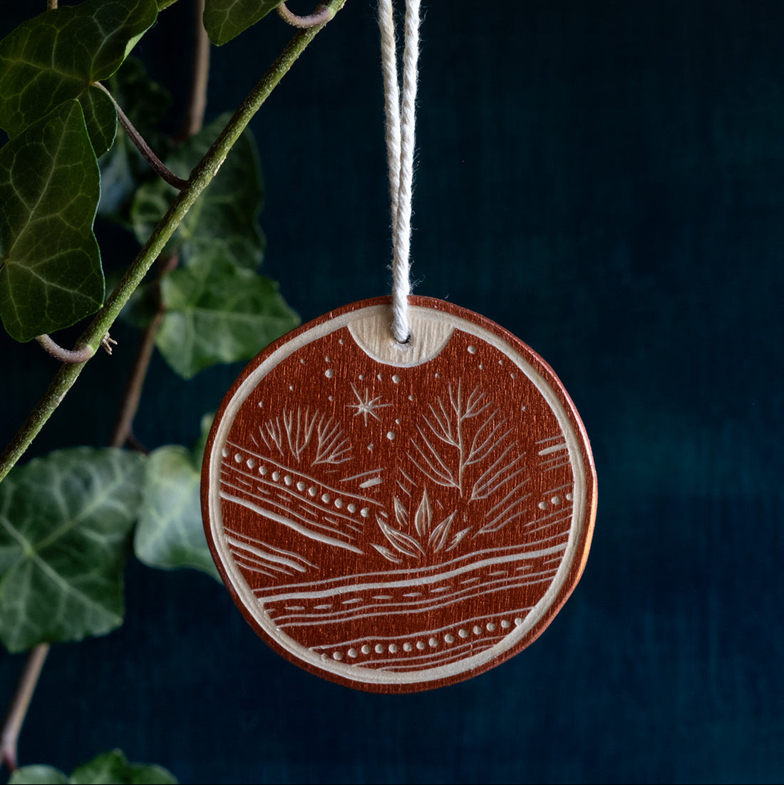 Woodcut ornament: Landscape